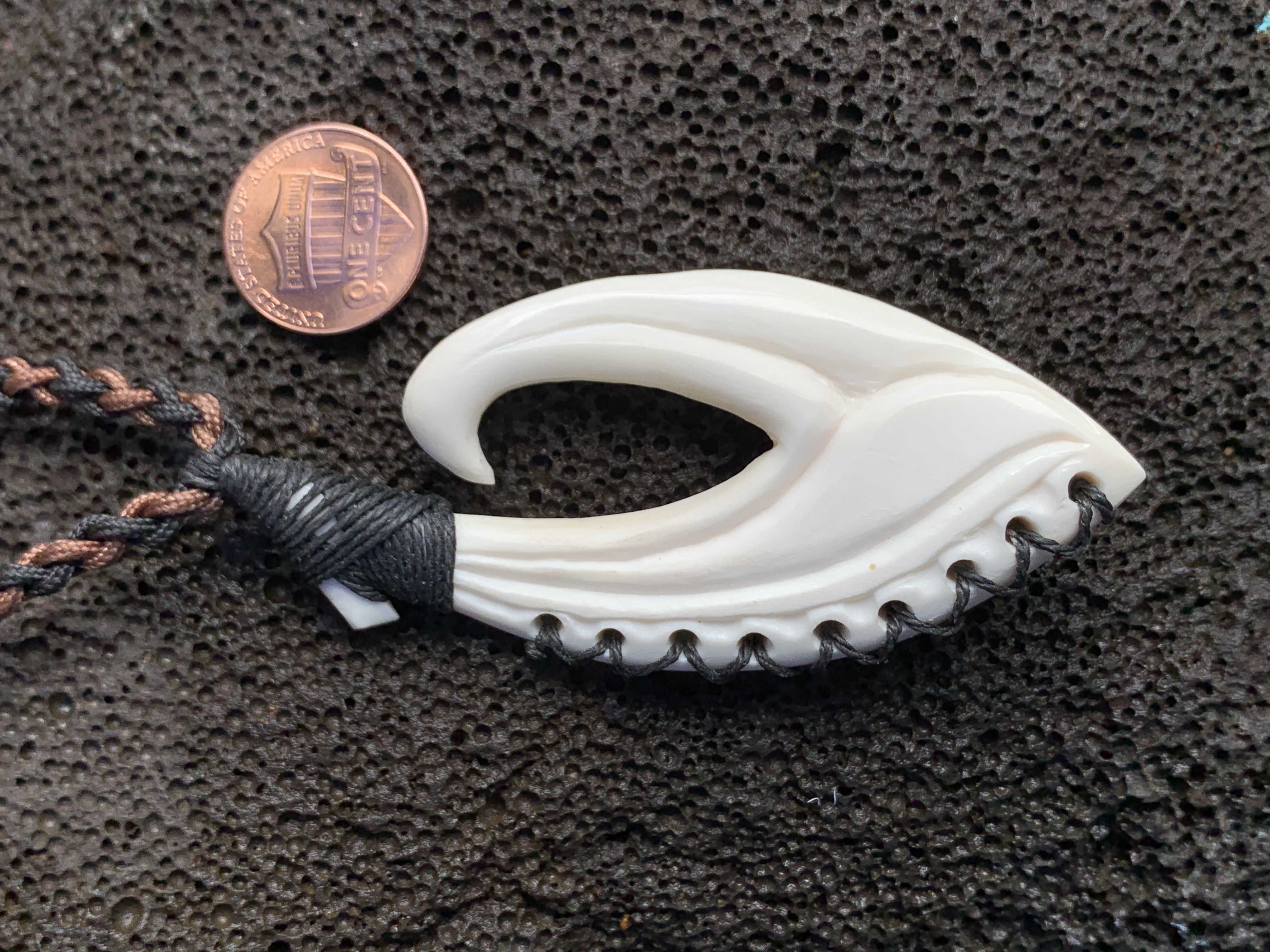 Polynesian-style bone pendant