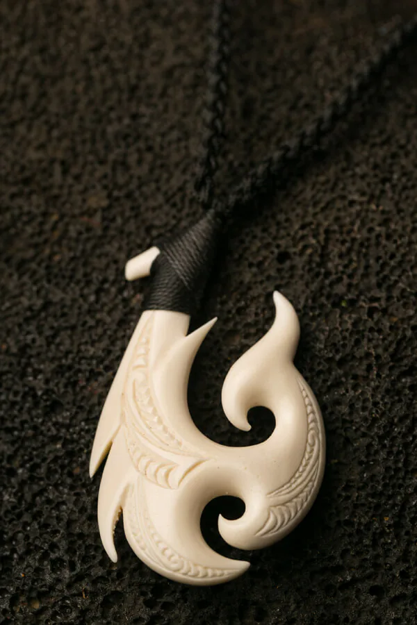 Hawaiian carved bone necklace with hand-braided cord